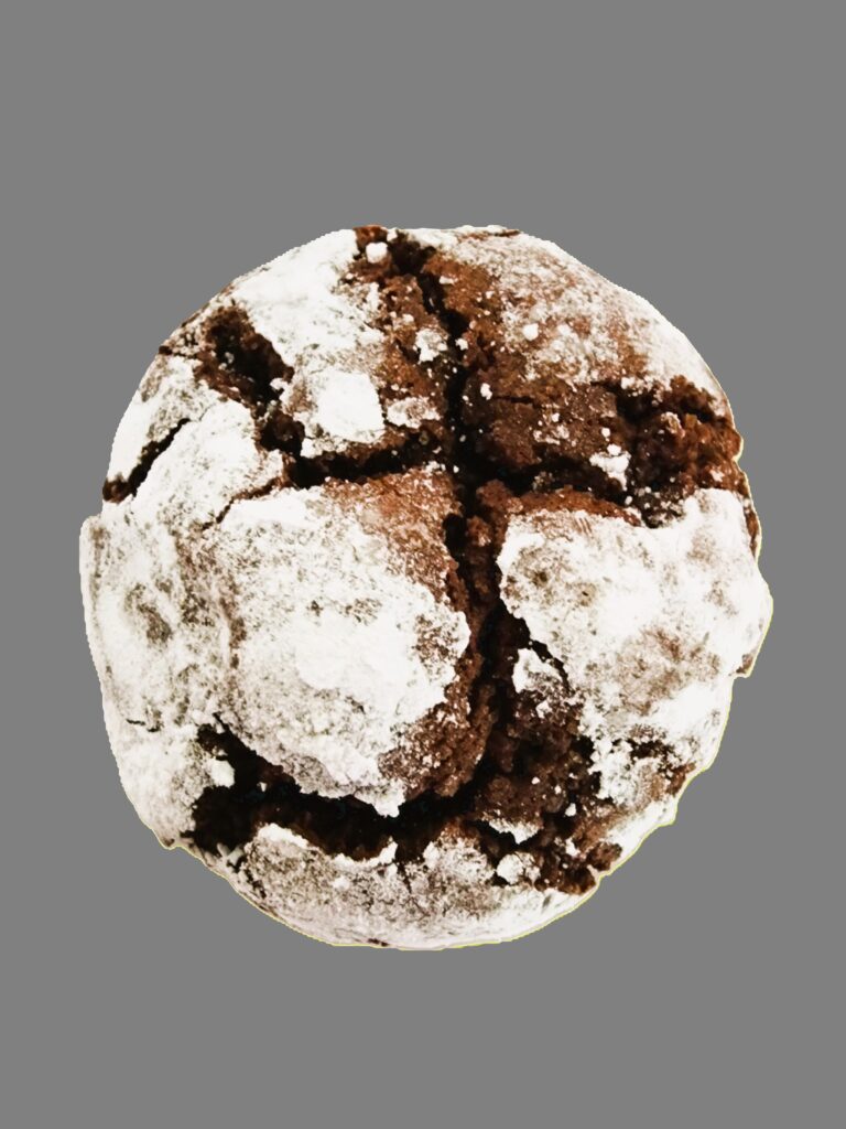 A chocolate crinkle cookie dusted with powdered sugar.