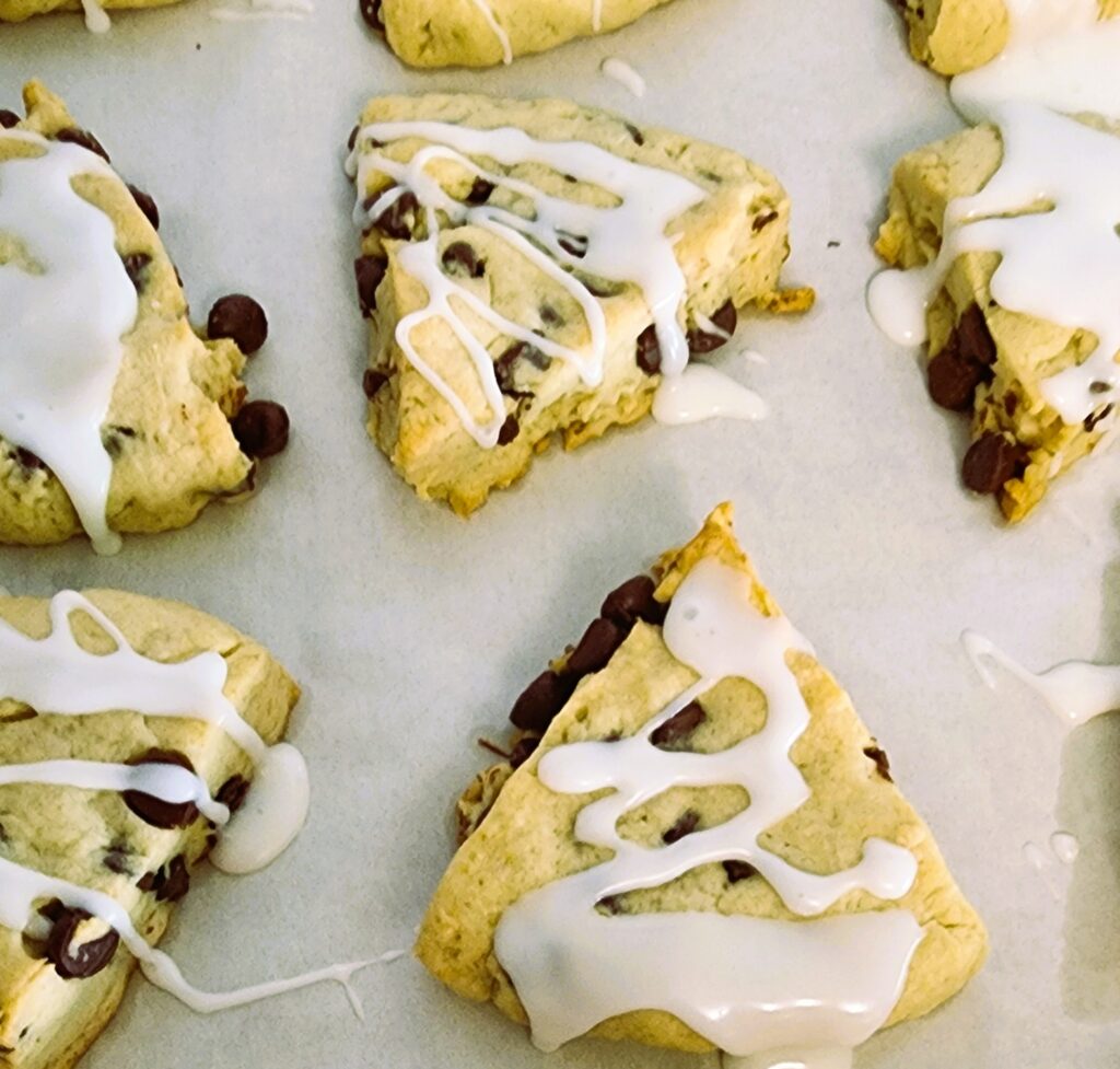 Iced triangular scones with chocolate chips